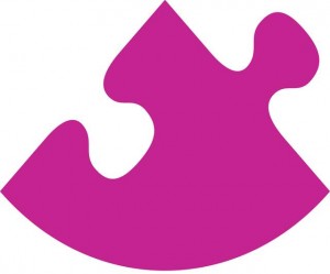 A pink jigsaw piece, part of the Canterbury BID logo