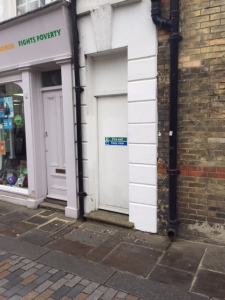 A storefront that has been cleaned of graffiti