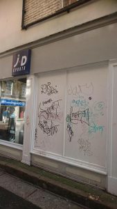Graffiti on JD Sports storefront