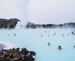 Some people bathing in a hot springs