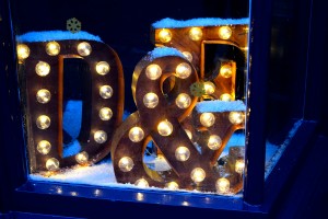 D&F light sign in a Dodgems & Floss christmas window