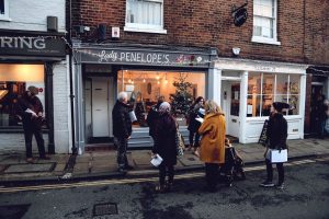 Christmas window competition judges outside of Lady Penelope's Florist