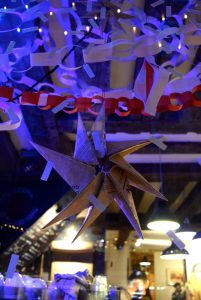 A festively decorated Burgate Coffeehouse window