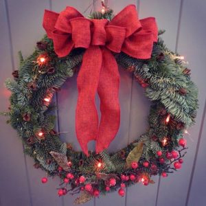 A wreath on the door of Lady Penelope's florist