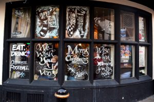 Christmas stickers in The Three Tuns Pub windows