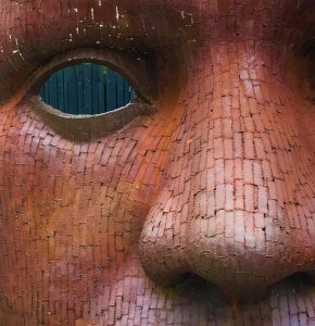 An up close picture of an art project of a person's face