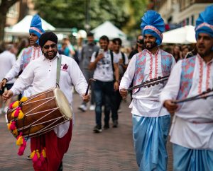 Some people marching and playing instruments in Canterbury