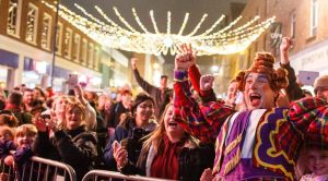 A crowd of people celebrating the Canterbury christmas lights switch on