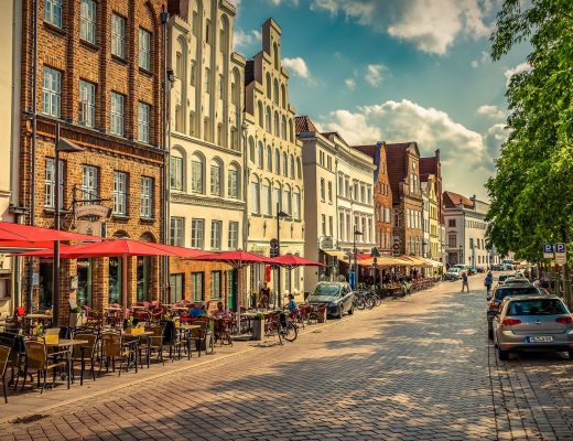 A strip of cafes and restaurants in a town centre in Brussels