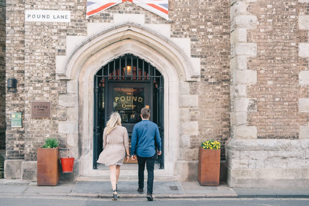 A photo of a man and woman about to enter The Pound in Canterbury