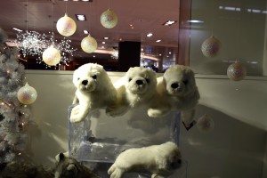 Stuffed toy white seals in a Fenwick christmas window