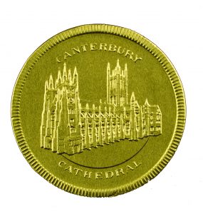 A gold coin with Canterbury Cathedral embossed on it