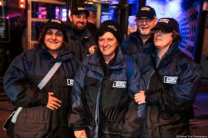 Some street pastors smiling together for a photo