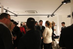 A room of people socialising and networking at a Designed Interiors event