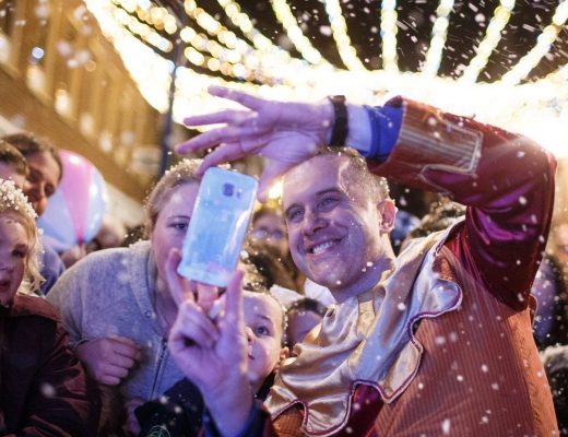 A crowd of people celebrating the Canterbury christmas lights switch on