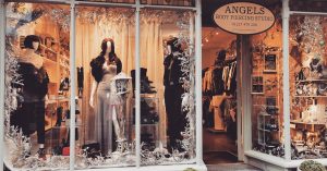 Angels body piercing studio windows decorated in white for christmas