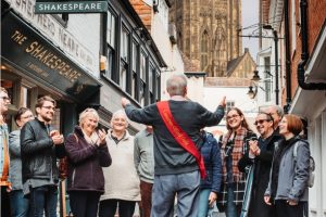 A photo of some people on a guided tour of Canterbury City Centre