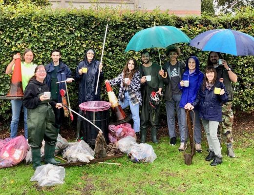 A photo of a group of people litter picking