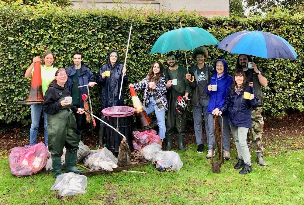 A photo of a group of people litter picking