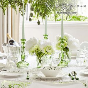 A photo of a white decorated dining table