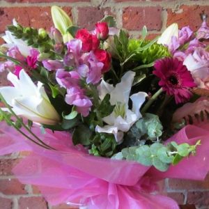 A pink and white flower arrangement