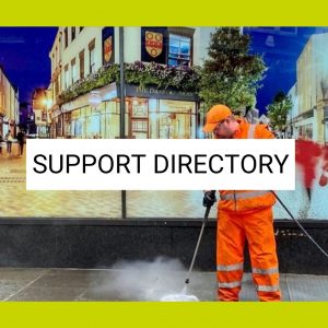 A photo of a man in high-vis uniform cleaning a pavement, with text over it that says support directory