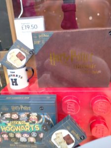A photo of a display of Harry Potter products in a shop window