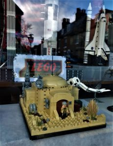 A photo of a Lego Star Wars scene in a shop window