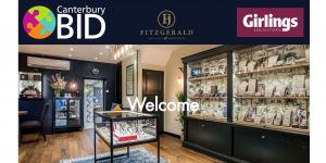 A photo of the interior of Fitzgerald jewellers that has the word welcome over it