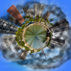 An edited photo of a city skyline, created to resemble a small globe, for the Canterbury Green Take Over
