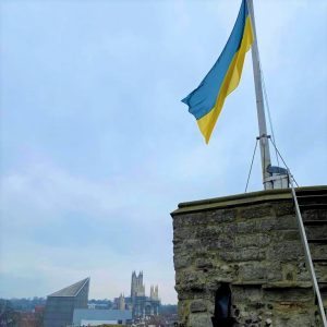 A photo of the Ukrainian flag atop Westgate Tower